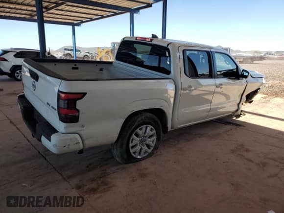 2023 Nissan Frontier SV with VIN 1N6ED1EK1PN668409, listed as a Copart auction lot 84835755 with 32,520 mi miles and Salvage title. Bid and sale history available at DreamBid. Image 3.