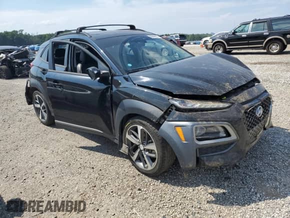 2021 Hyundai Kona Limited с VIN KM8K33A50MU620062, выставлен на аукционе Copart как лот 69649855 с пробегом 115 520 миль миль и Списание • Salvage title. История ставок и продаж доступна на DreamBid. Изображение 4.