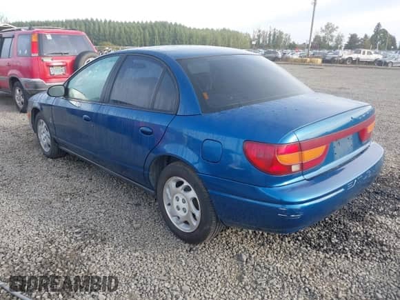 2000 Saturn SL with VIN 1G8ZK5275YZ143259, listed as a IAAI auction lot 43366243 with 121,018 mi miles and . Bid and sale history available at DreamBid. Image 3.