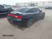 2014 Dodge Charger SXT Plus with VIN 2C3CDXJG1EH255124, listed as a IAAI auction lot 42635866 with 178,778 mi miles and . Bid and sale history available at DreamBid. Image 4.