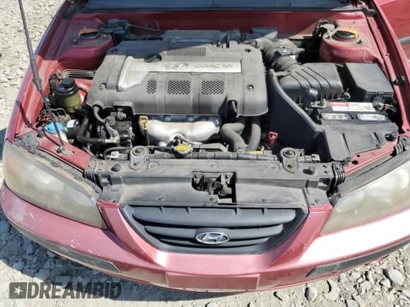 2004 Hyundai Elantra GT z VIN KMHDN56D14U109930, wystawiony jako Copart lot #65430945 z przebiegiem 74 504 mil mil oraz Szkoda całkowita • Salvage title. Historia ofert i sprzedaży dostępna na DreamBid. Obrazek 11.