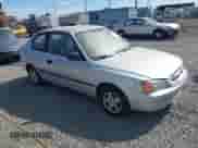 2002 Hyundai Accent z VIN KMHCF35G82U173856, wystawiony jako IAAI lot #42620048 z przebiegiem 128 986 mil mil oraz . Historia ofert i sprzedaży dostępna na DreamBid. Obrazek 1.