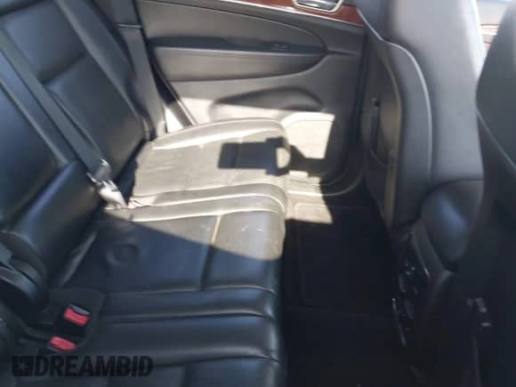 2013 Jeep Grand Cherokee Limited z VIN 1C4RJFBG4DC648995, wystawiony jako IAAI lot #43338050 z przebiegiem 138 551 mil mil oraz . Historia ofert i sprzedaży dostępna na DreamBid. Obrazek 8.