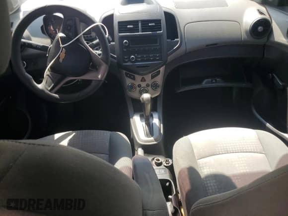 2013 Chevrolet Sonic LS с VIN 1G1JA5SH3D4106743, выставлен на аукционе Copart как лот 68265285 с пробегом 126 952 миль миль и Списание • Salvage title. История ставок и продаж доступна на DreamBid. Изображение 8.