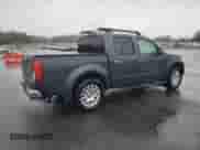 2010 Nissan Frontier LE with VIN 1N6AD0EV0AC419279, listed as a Copart auction lot 82463385 with 83,722 mi miles and Salvage title. Bid and sale history available at DreamBid. Image 3.