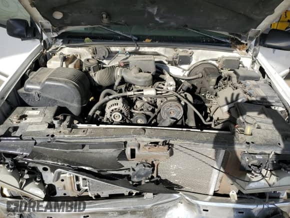 1996 GMC Sierra 1500 z VIN 2GTEC19R0T1563546, wystawiony jako Copart lot #55819425 z przebiegiem 176 900 mil mil oraz Szkoda całkowita • Salvage title. Historia ofert i sprzedaży dostępna na DreamBid. Obrazek 11.