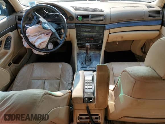 1997 BMW 7 Series 740iL with VIN WBAGJ8325VDM04352, listed as a Copart auction lot 70189534 with 129,463 mi miles and Salvage title. Bid and sale history available at DreamBid. Image 8.