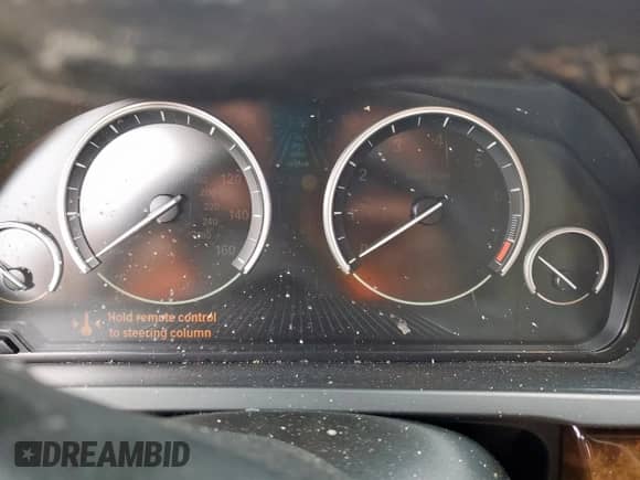 2013 BMW 7 Series 750Li с VIN WBAYE8C54DD132832, выставлен на аукционе Copart как лот 63086555 с пробегом Не указан миль и Списание • Salvage title. История ставок и продаж доступна на DreamBid. Изображение 9.