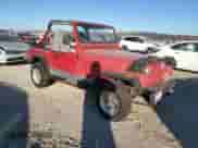 1991 Jeep Wrangler with VIN 2J4FY19P6MJ107521, listed as a Copart auction lot 84077214 with 1,311,216 mi miles and Clean title. Bid and sale history available at DreamBid. Image 4.