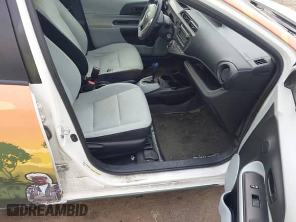 2014 Toyota Prius One z VIN JTDKDTB37E1569922, wystawiony jako IAAI lot #42956402 z przebiegiem 90 051 mil mil oraz . Historia ofert i sprzedaży dostępna na DreamBid. Obrazek 5.