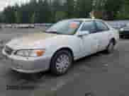 2000 Toyota Camry LE z VIN JT2BG22K4Y0432223, wystawiony jako Copart lot #89737405 z przebiegiem 230 409 mil mil oraz Czysty tytuł • Clean title. Historia ofert i sprzedaży dostępna na DreamBid. Obrazek 1.