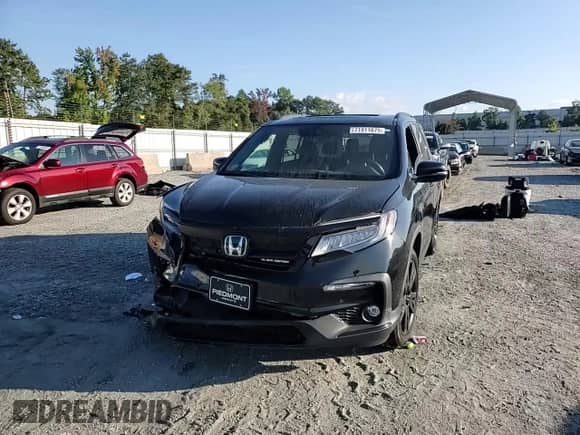 2021 Honda Pilot Black Edition с VIN 5FNYF6H76MB028978, выставлен на аукционе Copart как лот 71911075 с пробегом 40 931 миль миль и Списание • Salvage title. История ставок и продаж доступна на DreamBid. Изображение 14.