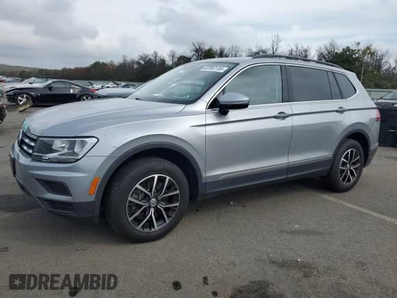 2021 Volkswagen Tiguan SE с VIN 3VV2B7AX7MM118770, выставлен на аукционе Copart как лот 82082155 с пробегом 80 787 миль миль и Списание • Salvage title. История ставок и продаж доступна на DreamBid. Изображение 1.