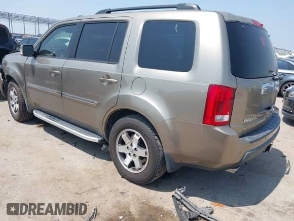 2009 Honda Pilot Touring with VIN 5FNYF38809B004142, listed as a IAAI auction lot 42337103 with 152,874 mi miles and . Bid and sale history available at DreamBid. Image 3.