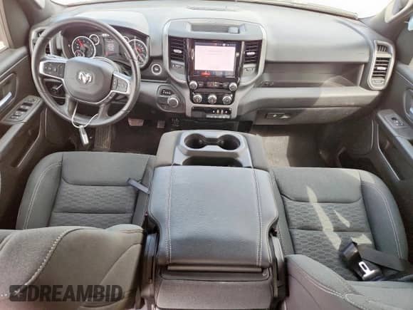 2025 Ram 1500 Tradesman with VIN 1C6RREGG8SN712282, listed as a Copart auction lot 81009595 with 8,097 mi miles and Salvage title. Bid and sale history available at DreamBid. Image 8.