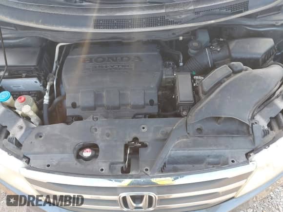 2012 Honda Odyssey LX z VIN 5FNRL5H2XCB065719, wystawiony jako IAAI lot #43173490 z przebiegiem 242 271 mil mil oraz . Historia ofert i sprzedaży dostępna na DreamBid. Obrazek 10.