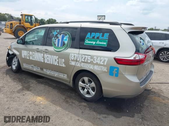2015 Toyota Sienna LE AAS with VIN 5TDKK3DC5FS568890, listed as a IAAI auction lot 43300989 with 243,285 mi miles and . Bid and sale history available at DreamBid. Image 3.