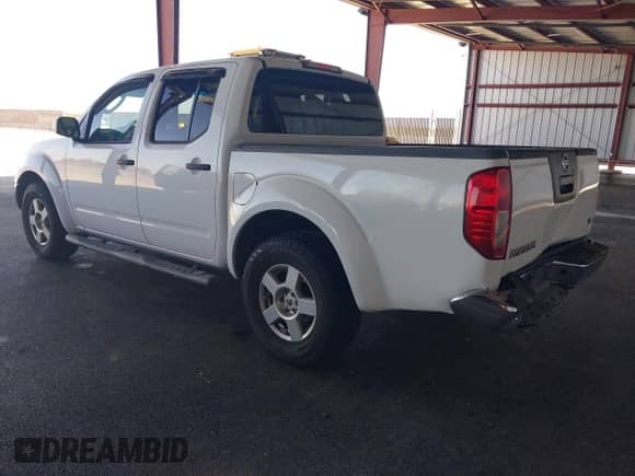 2008 Nissan Frontier SE with VIN 1N6AD07UX8C410054, listed as a IAAI auction lot 43227823 with 211,710 mi miles and . Bid and sale history available at DreamBid. Image 3.