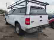 2005 Ford F-150 XL with VIN 1FTRF14W35NB19973, listed as a IAAI auction lot 43443336 with 323,169 mi miles and . Bid and sale history available at DreamBid. Image 3.