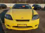 2006 Hyundai Tiburon GT с VIN KMHHN65FX6U202815, выставлен на аукционе Copart как лот 88673255 с пробегом Не указан миль и Списание • Salvage title. История ставок и продаж доступна на DreamBid. Изображение 5.