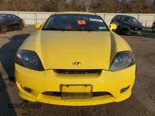 2006 Hyundai Tiburon GT с VIN KMHHN65FX6U202815, выставлен на аукционе Copart как лот 88673255 с пробегом Не указан миль и Списание • Salvage title. История ставок и продаж доступна на DreamBid. Изображение 5.
