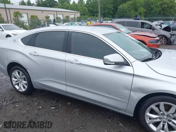 2018 Chevrolet Impala LT with VIN 1G1105SA1JU131478, listed as a IAAI auction lot 42341889 with 201,328 mi miles and . Bid and sale history available at DreamBid. Image 18.