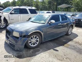 2007 Chrysler 300 with VIN 2C3KA43R07H731464, listed as a Copart auction lot 67166475 with 195,813 mi miles and Salvage title. Bid and sale history available at DreamBid. Image 1.
