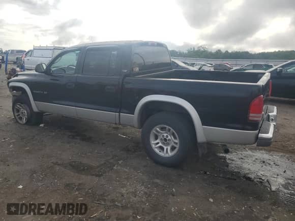 2001 Dodge Dakota Sport z VIN 1B7GG2AN41S143376, wystawiony jako Copart lot #64781805 z przebiegiem 19 110 mil mil oraz Czysty tytuł • Clean title. Historia ofert i sprzedaży dostępna na DreamBid. Obrazek 2.