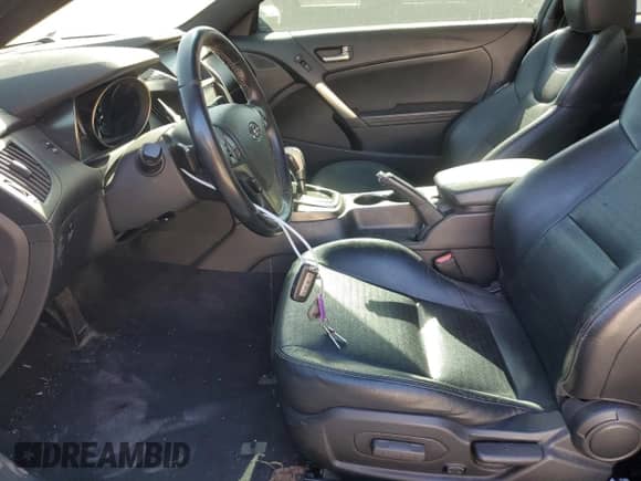 2013 Hyundai Genesis Coupe R-Spec с VIN KMHHU6KJ4DU109538, выставлен на аукционе Copart как лот 76791514 с пробегом 61 250 миль миль и Списание • Salvage title. История ставок и продаж доступна на DreamBid. Изображение 7.