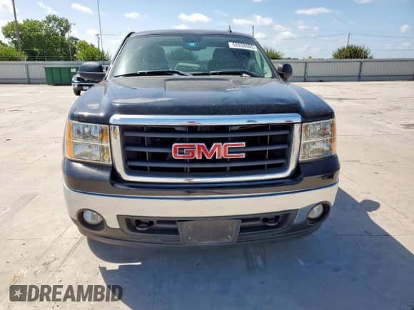 2008 GMC Sierra 1500 Work Truck with VIN 1GTEC19068Z328861, listed as a Copart auction lot 62938965 with 143,071 mi miles and Salvage title. Bid and sale history available at DreamBid. Image 5.