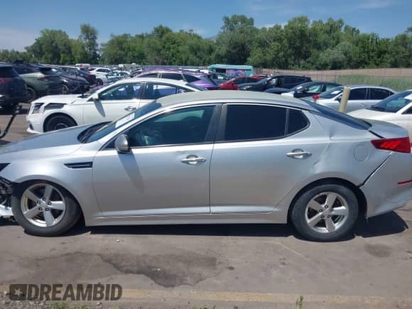 2015 Kia Optima LX with VIN 5XXGM4A75FG515363, listed as a IAAI auction lot 42537203 with 146,205 mi miles and . Bid and sale history available at DreamBid. Image 14.