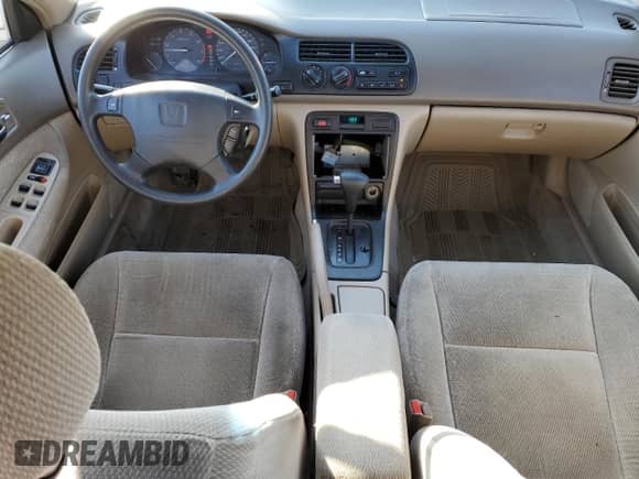 1997 Honda Accord LX with VIN 1HGCD5630VA809341, listed as a Copart auction lot 54182105 with 223,707 mi miles and Salvage title. Bid and sale history available at DreamBid. Image 8.