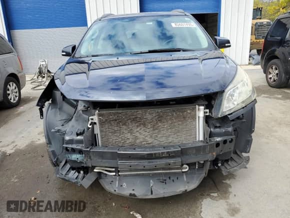 2015 Chevrolet Traverse LT with VIN 1GNKRHKD2FJ348129, listed as a Copart auction lot 85601495 with 102,579 mi miles and Salvage title. Bid and sale history available at DreamBid. Image 5.