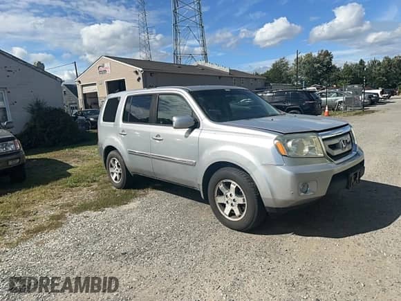 2010 Honda Pilot Touring с VIN 5FNYF4H88AB019661, выставлен на аукционе Copart как лот 85937495 с пробегом 188 907 миль миль и Чистый • Clean title. История ставок и продаж доступна на DreamBid. Изображение 1.