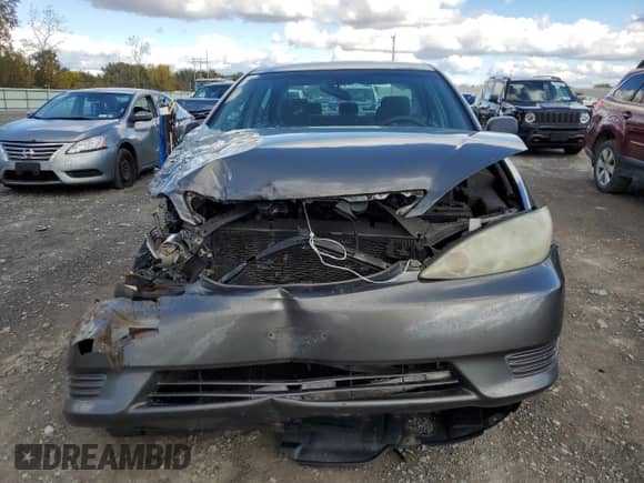 2005 Toyota Camry LE with VIN 4T1BE32K05U556010, listed as a Copart auction lot 82381835 with 210,797 mi miles and Salvage title. Bid and sale history available at DreamBid. Image 5.