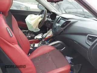 2014 Hyundai Veloster Turbo z VIN KMHTC6AE8EU195925, wystawiony jako IAAI lot #43149493 z przebiegiem 156 100 mil mil oraz . Historia ofert i sprzedaży dostępna na DreamBid. Obrazek 5.