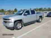 2018 Chevrolet Silverado 1500 LT with VIN 3GCUKREC4JG339988, listed as a IAAI auction lot 43222960 with 162,440 mi miles and . Bid and sale history available at DreamBid. Image 2.