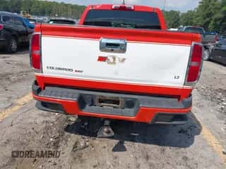 2020 Chevrolet Colorado 2WD LT z VIN 1GCGSCEN4L1143997, wystawiony jako IAAI lot #43251542 z przebiegiem 59 044 mil mil oraz . Historia ofert i sprzedaży dostępna na DreamBid. Obrazek 6.