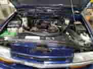 2005 Chevrolet Blazer z VIN 1GNCS18X65K101710, wystawiony jako Copart lot #76982844 z przebiegiem 129 988 mil mil oraz Szkoda całkowita • Salvage title. Historia ofert i sprzedaży dostępna na DreamBid. Obrazek 11.