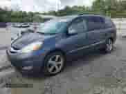 2006 Toyota Sienna XLE z VIN 5TDZA22C86S564606, wystawiony jako Copart lot #63309105 z przebiegiem 186 965 mil mil oraz Szkoda całkowita • Salvage title. Historia ofert i sprzedaży dostępna na DreamBid. Obrazek 1.