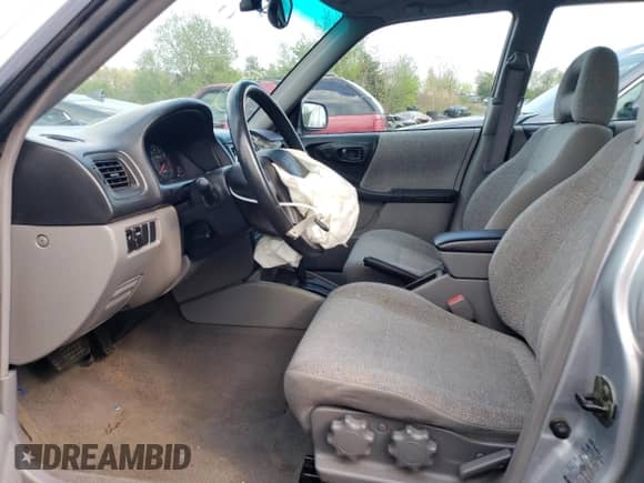 2002 Subaru Forester L with VIN JF1SF63532H752352, listed as a Copart auction lot 54620825 with 83,647 mi miles and Salvage title. Bid and sale history available at DreamBid. Image 7.