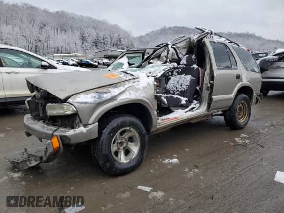 2003 Chevrolet Blazer LS с VIN 1GNCS13X63K129026, выставлен на аукционе Copart как лот 84567954 с пробегом Не указан миль и Списание • Salvage title. История ставок и продаж доступна на DreamBid. Изображение 1.