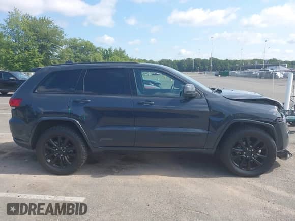 2017 Jeep Grand Cherokee Altitude with VIN 1C4RJFAG1HC895527, listed as a IAAI auction lot 43058018 with 78,447 mi miles and . Bid and sale history available at DreamBid. Image 13.