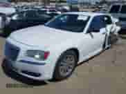 2014 Chrysler 300 C with VIN 2C3CCAET8EH169767, listed as a IAAI auction lot 42402262 with Not provided miles and . Bid and sale history available at DreamBid. Image 17.