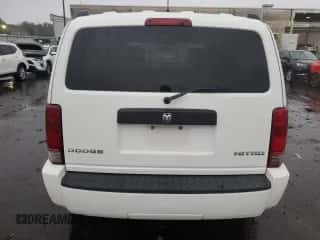 2010 Dodge Nitro SE с VIN 1D4PT2GK6AW121660, выставлен на аукционе Copart как лот 72792324 с пробегом 175 358 миль миль и Списание • Salvage title. История ставок и продаж доступна на DreamBid. Изображение 6.