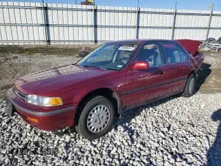 1992 Honda Accord LX z VIN JHMCB765XNC064960, wystawiony jako Copart lot #83900604 z przebiegiem 195 129 mil mil oraz Szkoda całkowita • Salvage title. Historia ofert i sprzedaży dostępna na DreamBid. Obrazek 1.