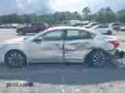 2016 Nissan Altima S z VIN 1N4AL3AP0GC154005, wystawiony jako IAAI lot #42982122 z przebiegiem 151 611 mil mil oraz . Historia ofert i sprzedaży dostępna na DreamBid. Obrazek 13.