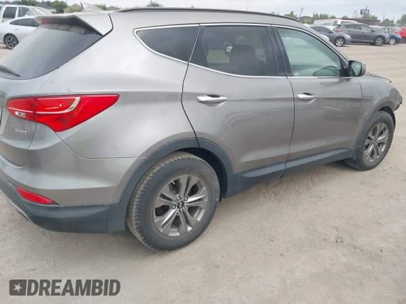2015 Hyundai Santa Fe с VIN 5XYZU3LB7FG263650, выставлен на аукционе IAAI как лот 42888139 с пробегом 72 285 миль миль и . История ставок и продаж доступна на DreamBid. Изображение 4.