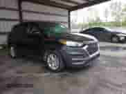 2021 Hyundai Tucson SE with VIN KM8J23A46MU407316, listed as a IAAI auction lot 43361613 with 79,865 mi miles and . Bid and sale history available at DreamBid. Image 1.