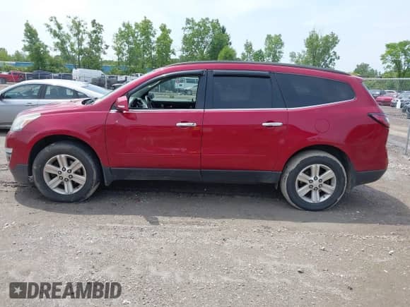 2014 Chevrolet Traverse LT z VIN 1GNKRHKD4EJ160615, wystawiony jako IAAI lot #42534498 z przebiegiem 123 495 mil mil oraz . Historia ofert i sprzedaży dostępna na DreamBid. Obrazek 14.
